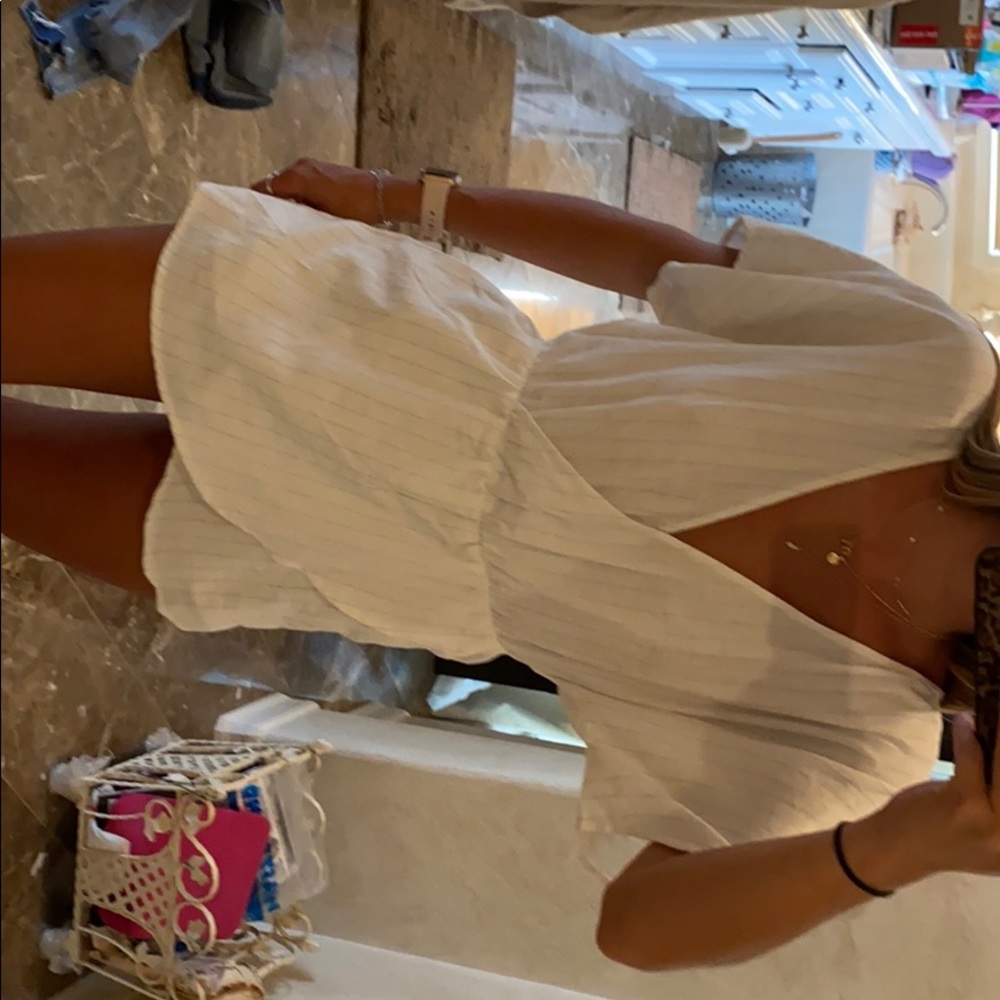 White romper with light blue pinstripes